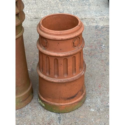 119 - Two terracotta chimney pots - approx. largest 91cm high