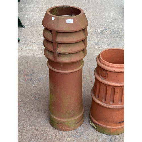 119 - Two terracotta chimney pots - approx. largest 91cm high