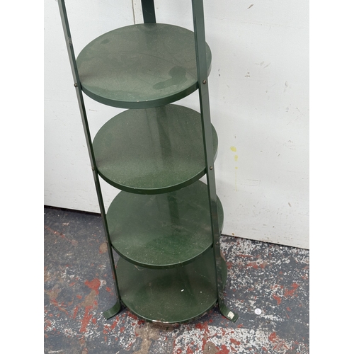 122 - A green metal six tier plant stand - approx. 126cm high