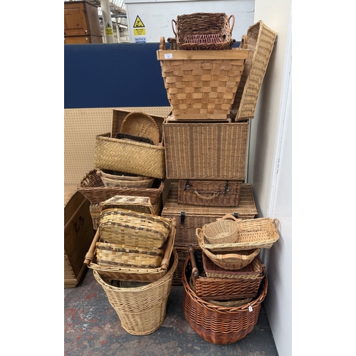 126 - Fifty-two wicker baskets