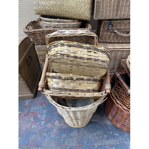 126 - Fifty-two wicker baskets