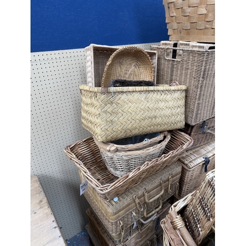 126 - Fifty-two wicker baskets
