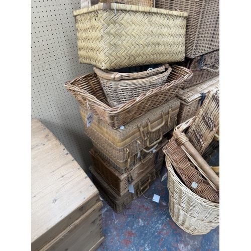 126 - Fifty-two wicker baskets