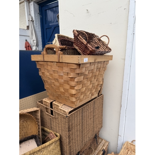 126 - Fifty-two wicker baskets