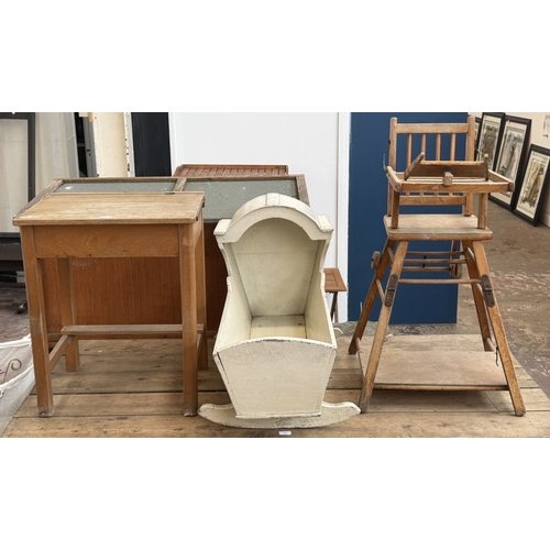 128 - Three pieces of furniture, one mid 20th century beech child's school desk, one antique white painted... 