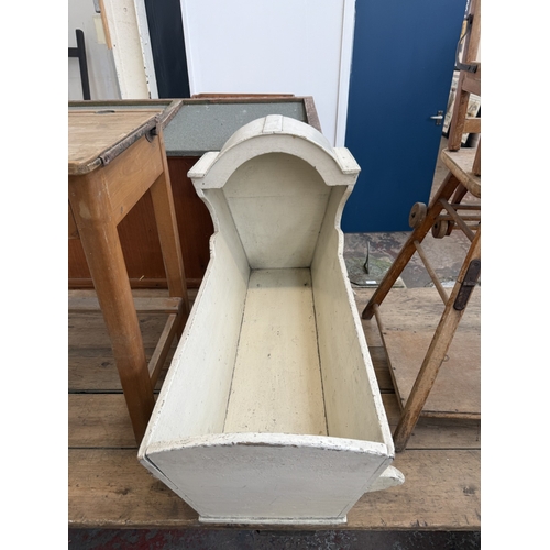 128 - Three pieces of furniture, one mid 20th century beech child's school desk, one antique white painted... 