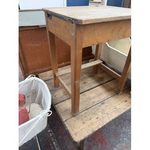 128 - Three pieces of furniture, one mid 20th century beech child's school desk, one antique white painted... 