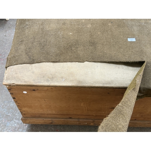 129 - A late 19th/early 20th century pine and fabric top blanket box - approx. 62cm high x 134cm wide x 53... 