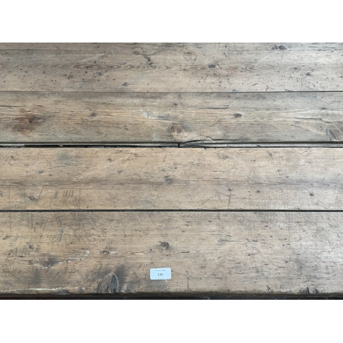130 - An early 20th century pine folding trestle table - approx. 72cm high x 85cm wide x 182cm long