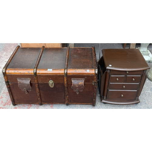 131 - Two pieces of furniture, one early 20th century brown painted and wooden banded travel trunk and one... 