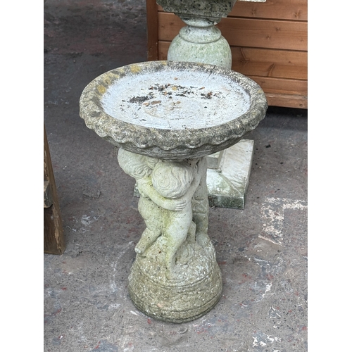 132 - A cast stone cherub pedestal bird bath - approx. 52cm high x 36cm diameter