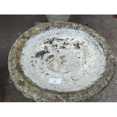 132 - A cast stone cherub pedestal bird bath - approx. 52cm high x 36cm diameter
