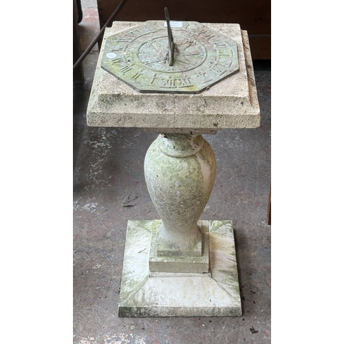 133 - A 19th century style cast stone sundial with metal top - approx. 76cm high x 32cm wide x 32cm deep