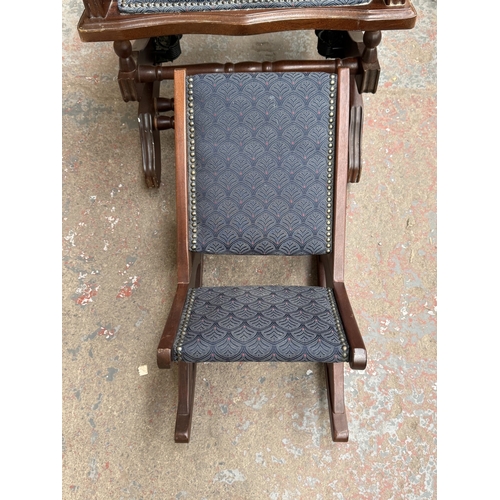 142 - Two pieces of mid/late 20th century mahogany and blue fabric upholstered furniture, one gout stool a... 