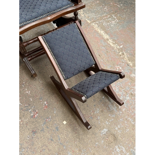 142 - Two pieces of mid/late 20th century mahogany and blue fabric upholstered furniture, one gout stool a... 