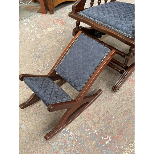 142 - Two pieces of mid/late 20th century mahogany and blue fabric upholstered furniture, one gout stool a... 