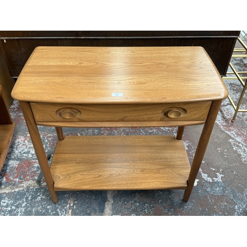 146 - An Ercol Windsor blonde elm and ash console table - approx. 72cm high x 79cm wide x 41cm deep