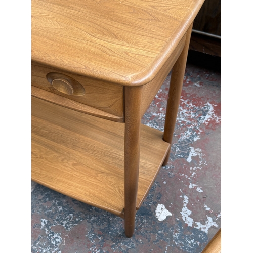 146 - An Ercol Windsor blonde elm and ash console table - approx. 72cm high x 79cm wide x 41cm deep