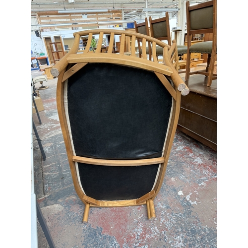148 - An early Renaissance ash two-seater sofa with beige fabric cushioned cushions - approx. 93cm high x ... 