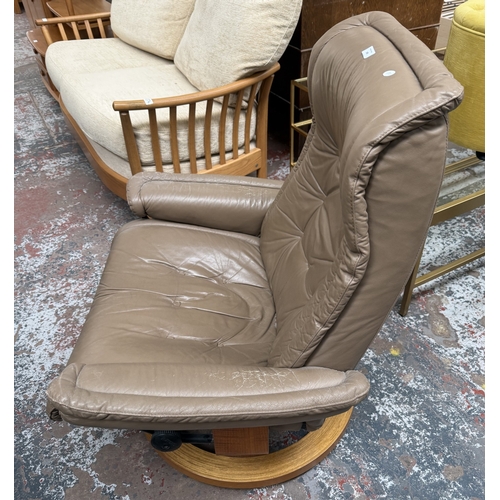 149 - An Ekornes Stressless tan leather and bentwood swivel reclining armchair - approx. 99cm high x 87cm ... 