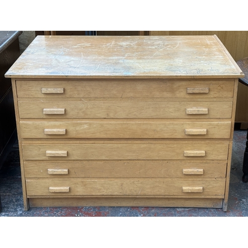 154 - A mid 20th century beech six-drawer plan chest - approx. 84cm high x 122cm wide x 92cm deep