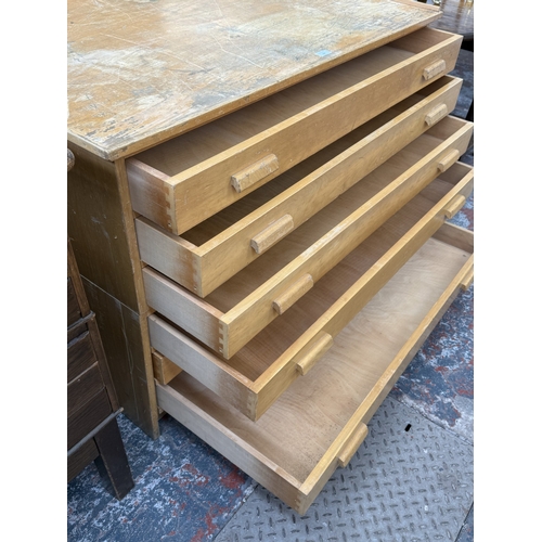 154 - A mid 20th century beech six-drawer plan chest - approx. 84cm high x 122cm wide x 92cm deep