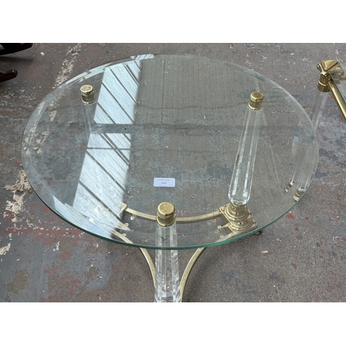 155 - Two Hollywood Regency style glass, brass and lucite side tables, one circular - approx. 50cm high x ... 