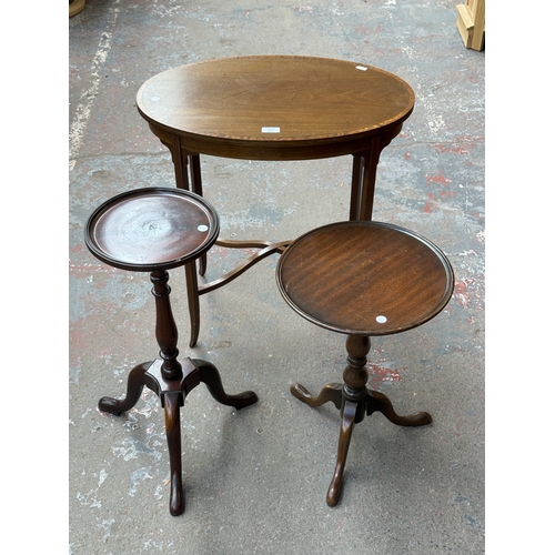 157 - Three mahogany side tables, one Edwardian inlaid oval and two circular tripod - largest approx. 67cm... 