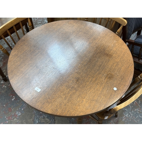 159 - A late 20th century oak and beech circular dining table - approx. 73cm high x 91cm diameter