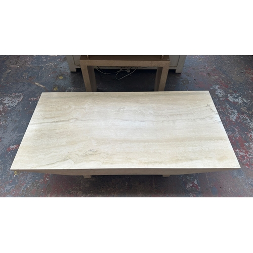 162 - A travertine and gilt metal rectangular coffee table - approx. 40cm high x 70cm wide x 140cm long