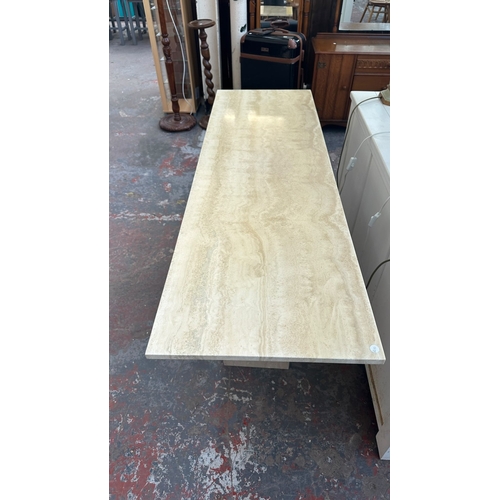 163 - A travertine and gilt metal console table - approx. 75cm high x 160cm wide x 50cm deep