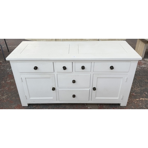 165 - A Halo white painted oak sideboard - approx. 77cm high x 150cm wide x 56cm deep