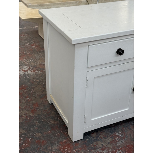 165 - A Halo white painted oak sideboard - approx. 77cm high x 150cm wide x 56cm deep