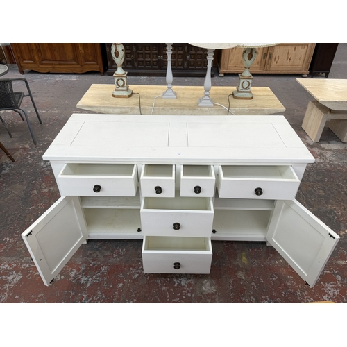 165 - A Halo white painted oak sideboard - approx. 77cm high x 150cm wide x 56cm deep