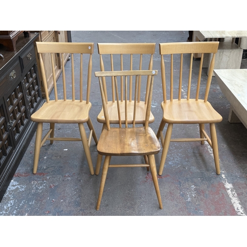 166 - Four spindle-back dining chairs, one Ercol model 391 blonde elm and beech, and three modern Ercol st... 