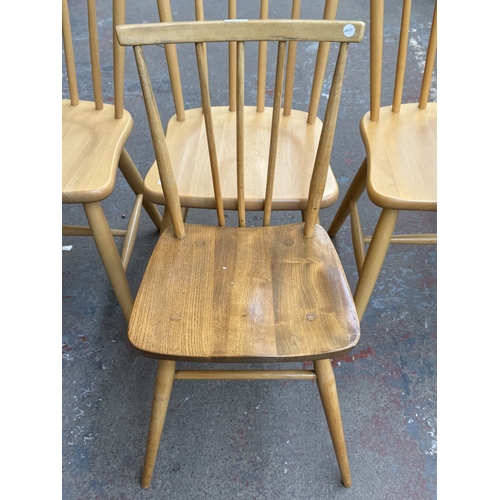 166 - Four spindle-back dining chairs, one Ercol model 391 blonde elm and beech, and three modern Ercol st... 
