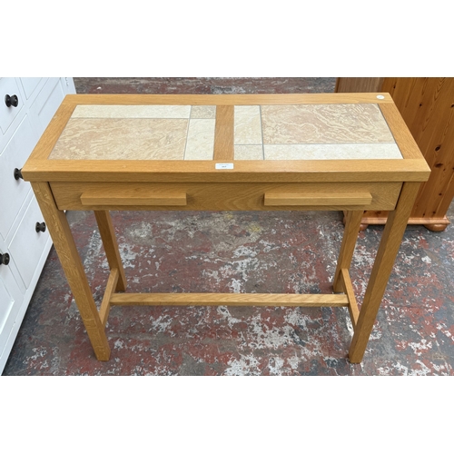 167 - A modern oak and tiled top single-drawer console table - approx. 75cm high x 85cm wide x 35cm deep