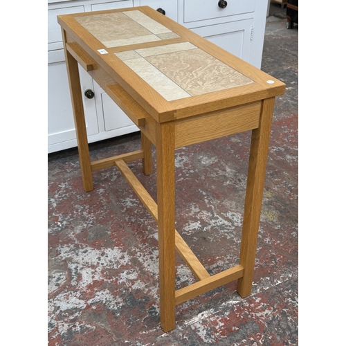 167 - A modern oak and tiled top single-drawer console table - approx. 75cm high x 85cm wide x 35cm deep