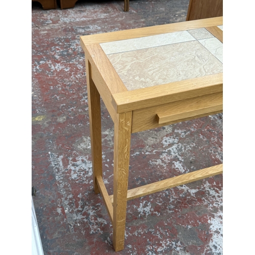 167 - A modern oak and tiled top single-drawer console table - approx. 75cm high x 85cm wide x 35cm deep