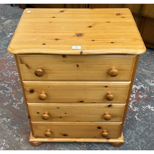 169 - A pine chest of drawers - approx. 75cm high x 61cm wide x 44cm deep