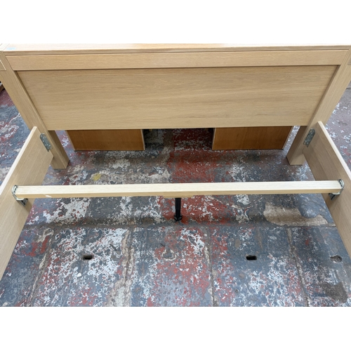 171 - A modern limed oak kingsize bedframe - approx. 80cm high x 172cm wide x 219cm deep