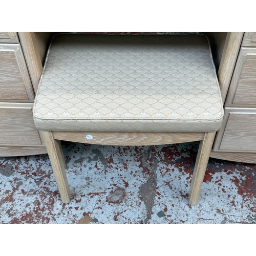 172 - A 1990s Stag Summer Oak limed oak dressing table with mirror and stool - approx. 142cm high x 158cm ... 