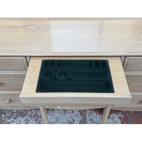 172 - A 1990s Stag Summer Oak limed oak dressing table with mirror and stool - approx. 142cm high x 158cm ... 