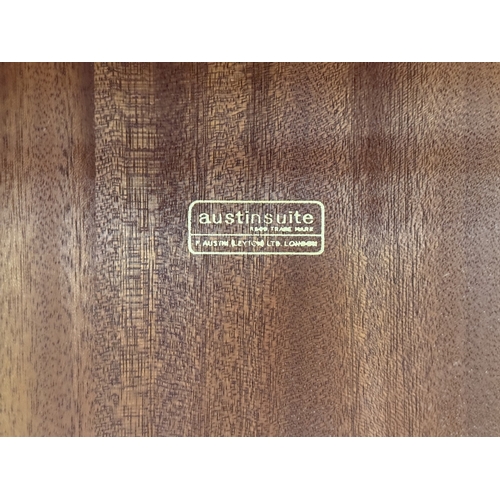 178 - A mid 20th century Austinsuite carved oak four piece bedroom suite comprising two double wardrobes, ... 