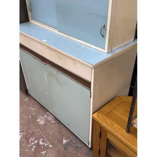 74 - A mid 20th century Eastham white painted and blue laminate kitchen cabinet - approx. 152cm high x 10... 