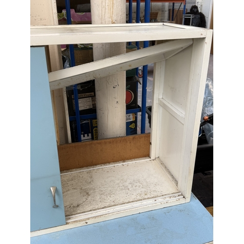 74 - A mid 20th century Eastham white painted and blue laminate kitchen cabinet - approx. 152cm high x 10... 