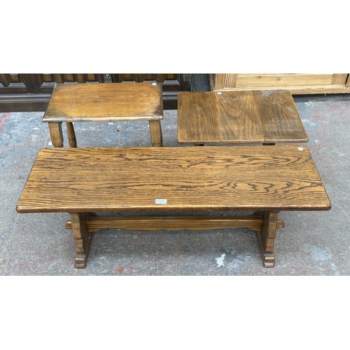 175 - Three oak occasional tables, one 17th century style, one drop-leaf swivel top, and one rectangular -... 