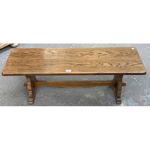 175 - Three oak occasional tables, one 17th century style, one drop-leaf swivel top, and one rectangular -... 