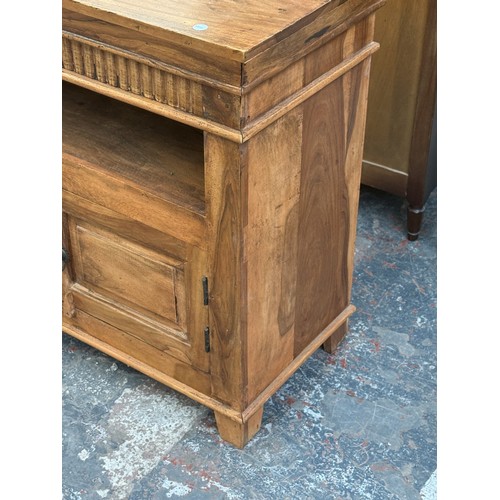 176 - A sheesham wood TV stand - approx. 76cm high x 91cm wide x 39cm deep