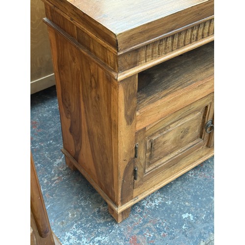 176 - A sheesham wood TV stand - approx. 76cm high x 91cm wide x 39cm deep